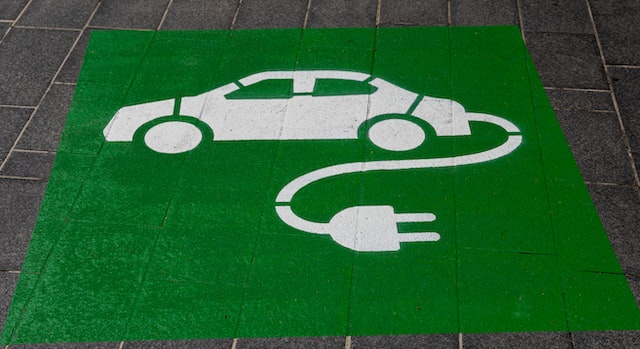 graphic of electric car with plug